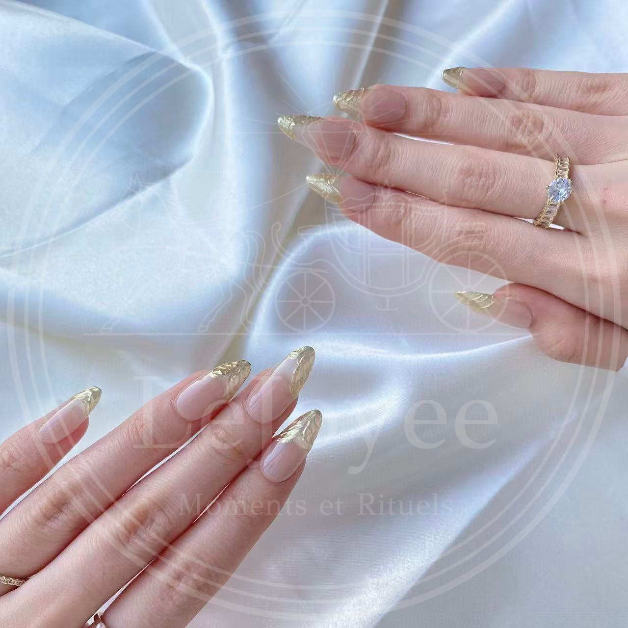 Detailed shot of the thumb nail featuring a bold, wavy gold chrome tip design that blends seamlessly into the natural nail color.