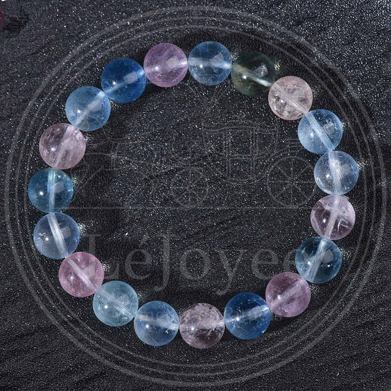 A luminous heart-healing gemstone bracelet composed of glowing pink, blue, and green Morganite, symbolizing pure divine love and emotional clarity.