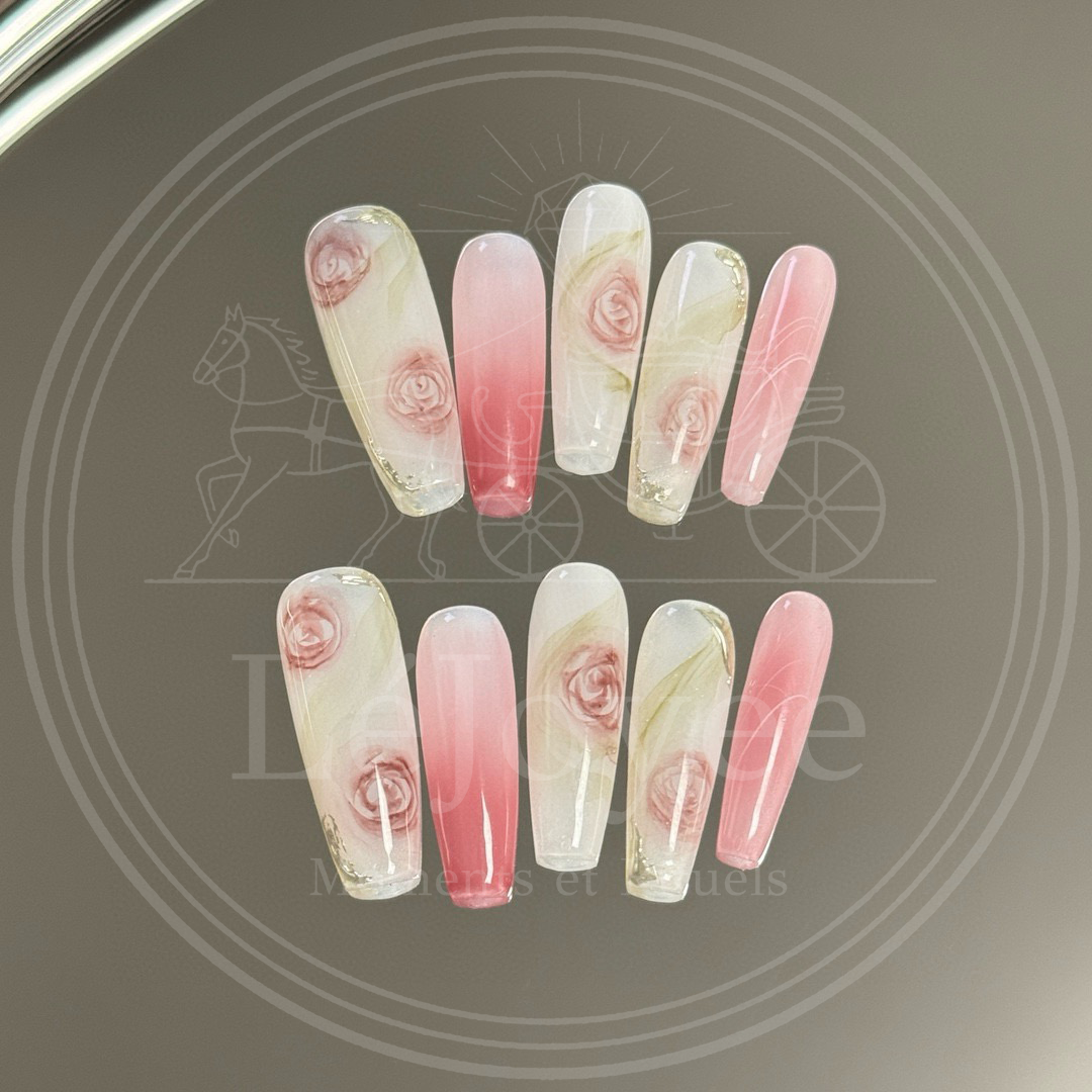 Luxury handmade press-on nails "Roseate Sonnet" featuring a milky white base with hand-painted vintage pink roses and soft blush gradient accents.