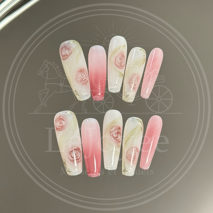Luxury handmade press-on nails "Roseate Sonnet" featuring a milky white base with hand-painted vintage pink roses and soft blush gradient accents.