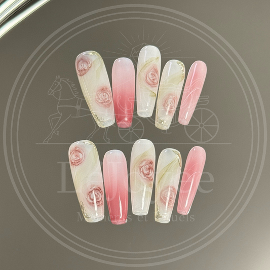 Luxury handmade press-on nails "Roseate Sonnet" featuring a milky white base with hand-painted vintage pink roses and soft blush gradient accents.