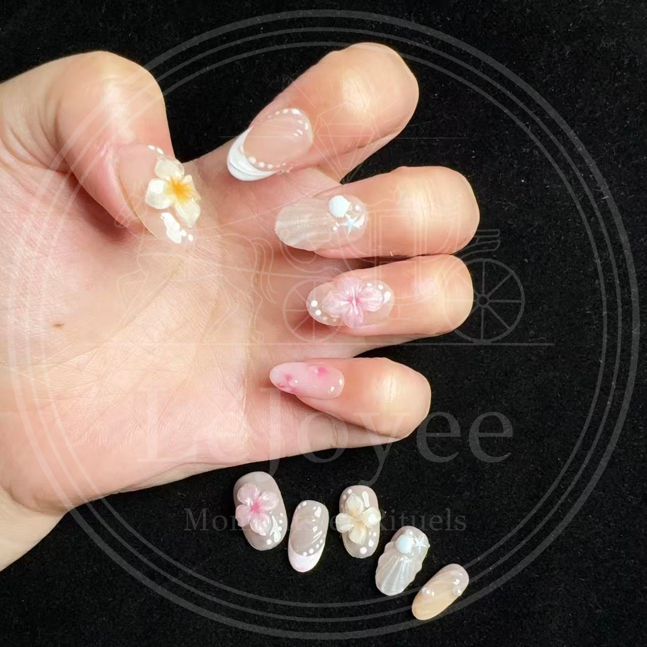 Sweet and fresh nail art design featuring soft pink blush gradient tips scattered with delicate white polka dots on a sheer natural base.